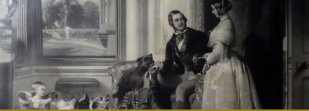 Royal Family at home: Mother and father with child and dogs